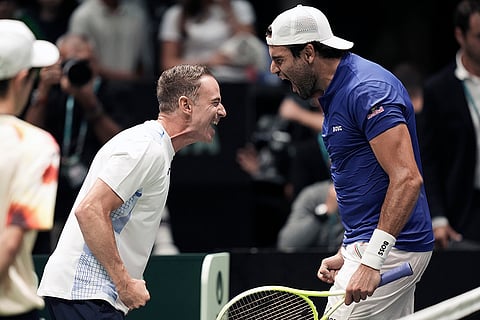 Davis Cup Tennis, Italy vs Brazil: Matteo Berrettini, right, celebrates with captain Filippo Volandri
